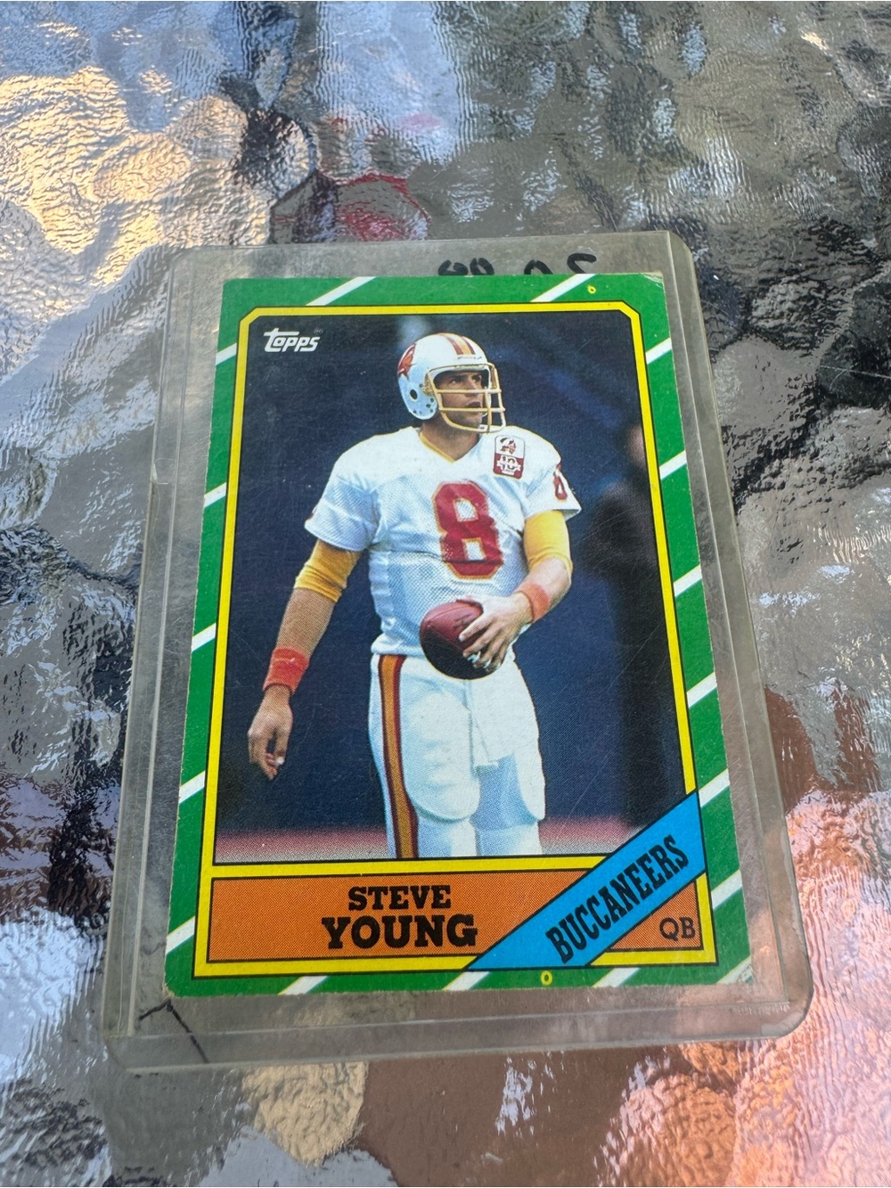 Topps Football Card with Green Border and Blue Banner